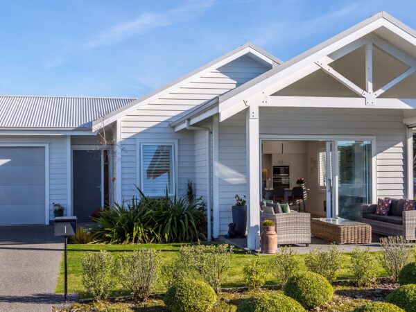 Retirement village villa exterior with garden