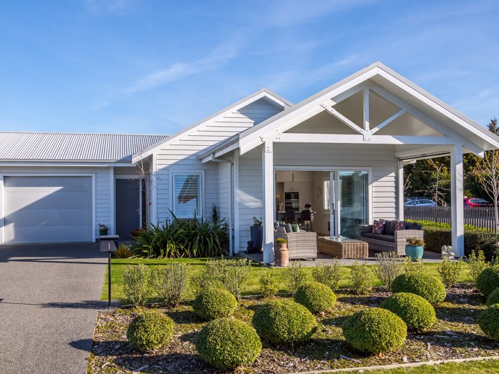 Retirement village villa exterior with garden